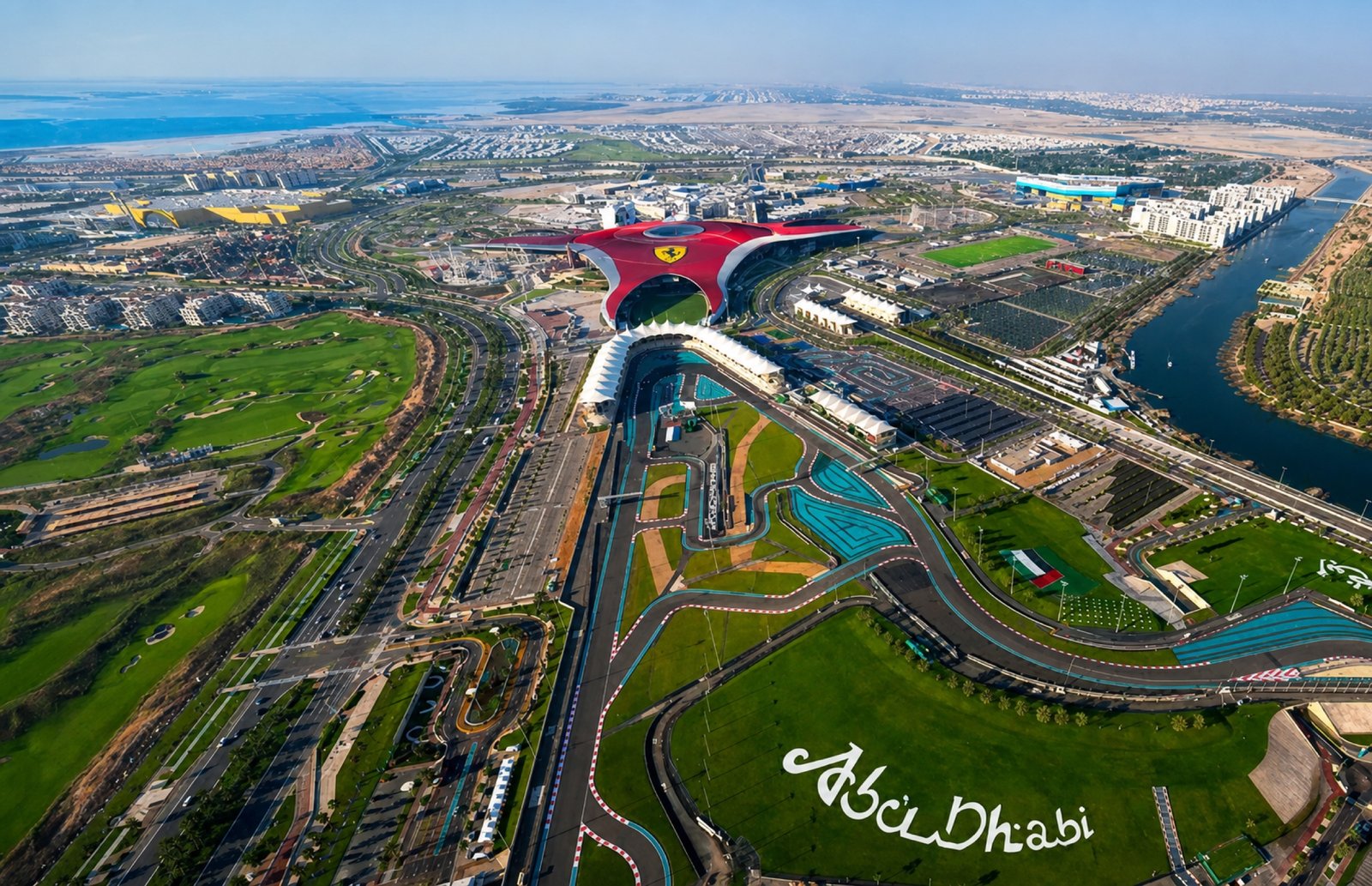 Aerial view across Yas Marina Circuit and Ferrari World on Yas Island